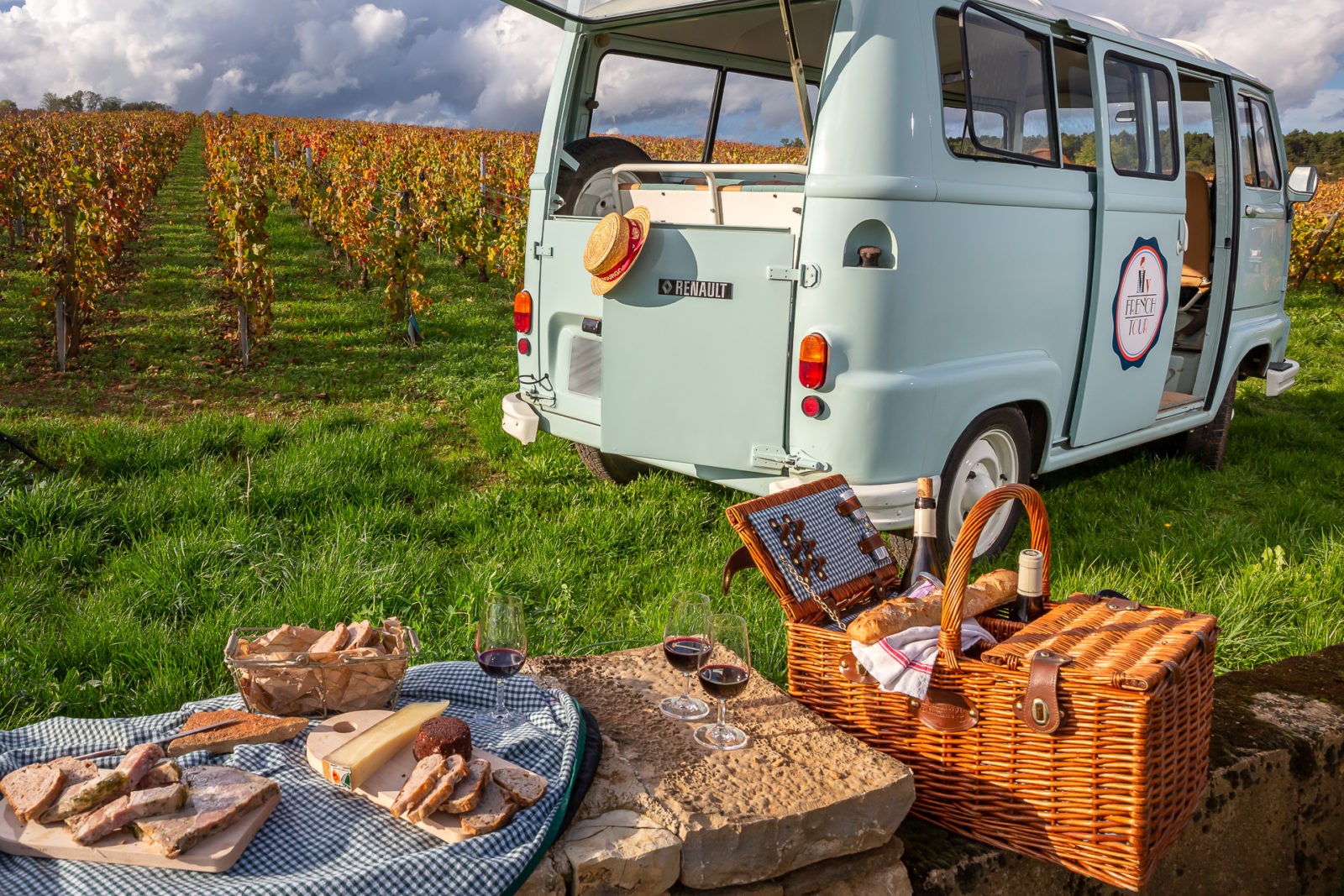 Drink in the vineyard in a vintage van